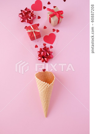 Waffle cone with valentine element on pink background. Holiday concept. Waffle cone with valentine element on pink background. Holiday concept. 60887208