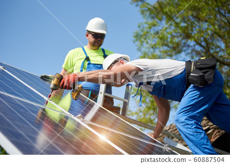 Stand-alone exterior solar panel system installation, renewable green energy generation concept. 60887504