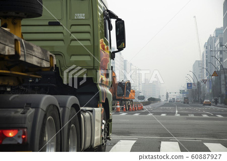 Fork-lanes working with special vehicles on the road 60887927