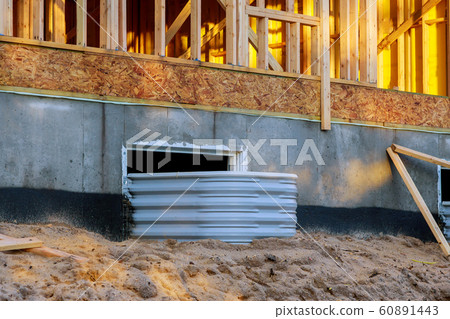 Windowswell on basement construction from window Windowswell on basement construction from window 60891443