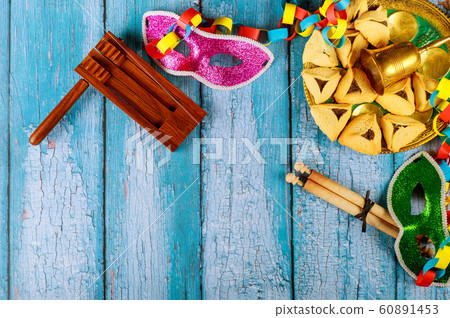 Jewish carnival Purim celebration on hamantaschen 60891453