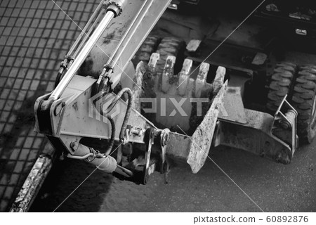 Bucket hydroexcavator in operation Bucket hydroexcavator in operation 60892876