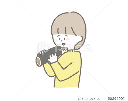 Woman eating Ehomaki Woman eating Ehomaki 60894001