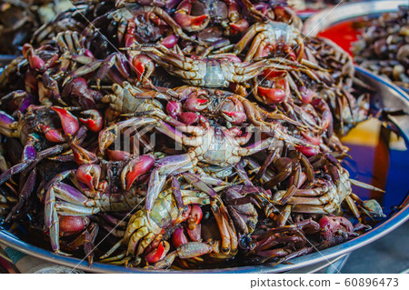 Crab in fish sauce at market street food. 60896473