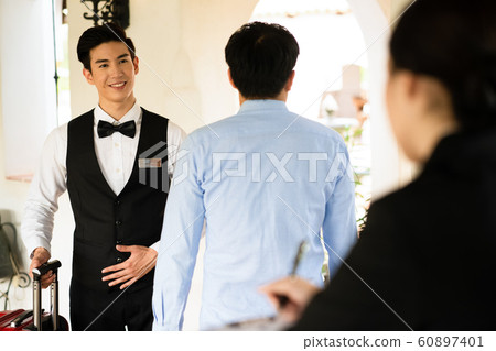 Men and women hotel staff 60897401
