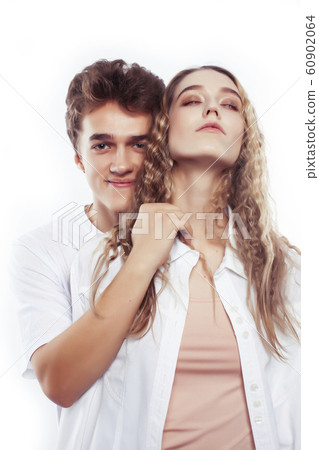 young pretty couple together posing cheerful isolated on white background, lifestyle people concept, happy boy and girl 60902064