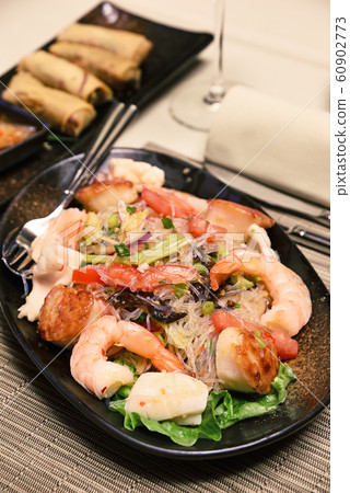 Spicy seafood with glass noodle salad 60902773