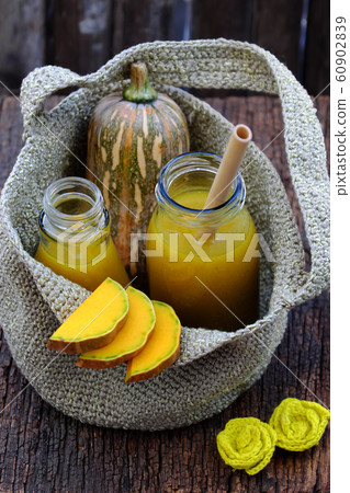 butternut squash milk bottle, yellow healthy, nutritious drink for breakfast  60902839