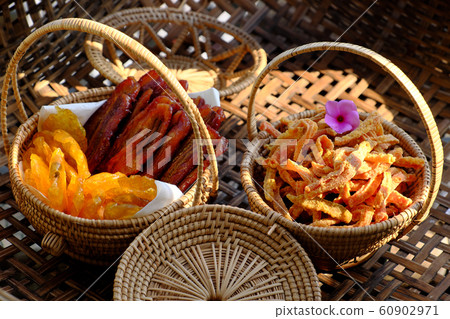 Vietnamese traditional food tet holiday, fruit and vegetables sweet jam from carrot, kumquat, banana, water chestnut Vietnamese traditional food tet holiday, fruit and vegetables sweet jam from carrot, kumquat, banana, water chestnut 60902971