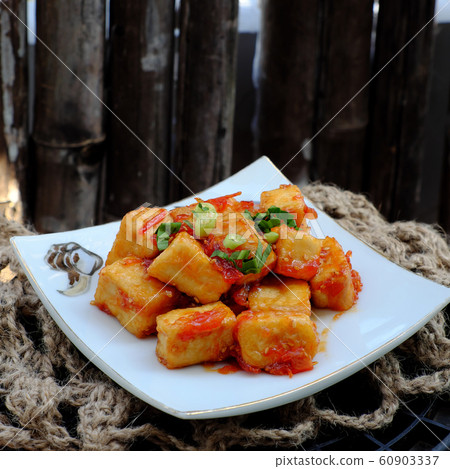 fried tofu cook with tomato sauce, healthy, nutrition and delicious Vietnamese food 60903337