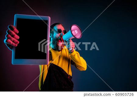 Caucasian man's portrait isolated on gradient studio background in neon light Caucasian man's portrait isolated on gradient studio background in neon light 60903726