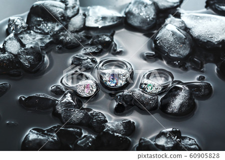 Transparent icy rings made from glass in ice and Transparent icy rings made from glass in ice and 60905828