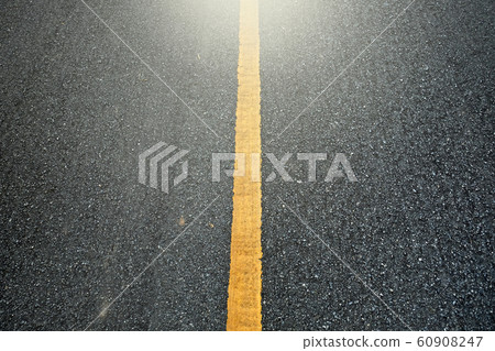 New asphalt texture with yellow line on road 60908247