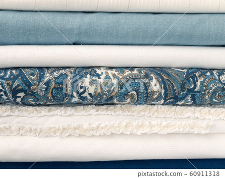 Stack of summer blue and white clothes Stack of summer blue and white clothes 60911318