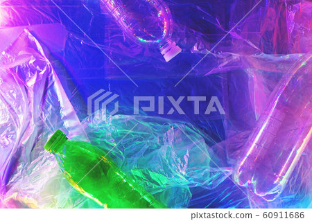 Plastic bottles on plastic background in neon lights. 60911686