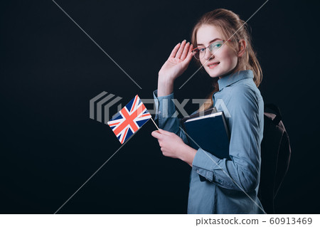 Young English Student Girl With British Flag Adjusting Glasses Young English Student Girl With British Flag Adjusting Glasses 60913469