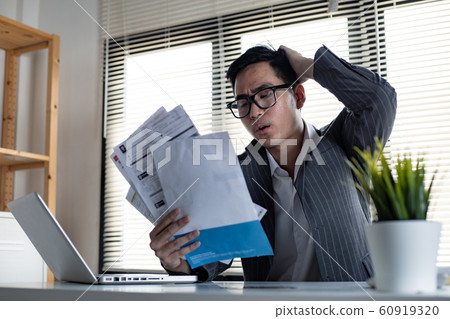 Asian man is stressed and overthink by debt from Asian man is stressed and overthink by debt from 60919320