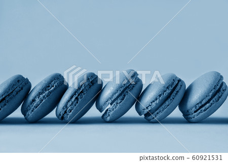 Pink and purple macaroons on pink 60921531