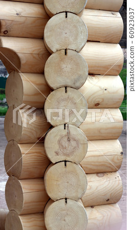 Timber logs wall closeup. 60923037