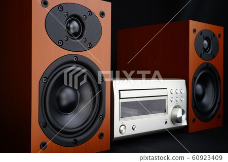 Component stereo speakers woodgrain black background black background 60923409