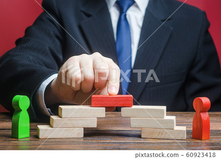 The man provides the conditions for negotiations and conflict resolution between opponents. Arbitrator mediator. Search for compromise. Confrontation rivals. Build bridges improve relationships 60923418
