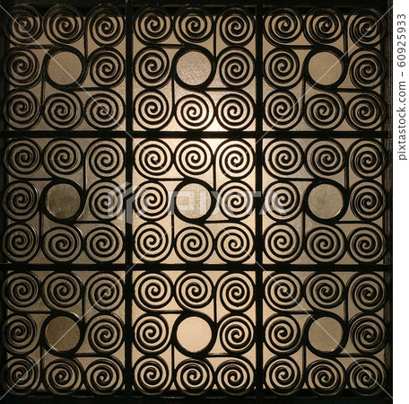 Wrought Greek iron gate grille made of spirals 60925933