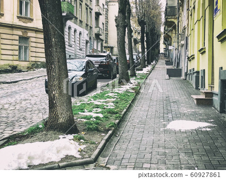 Architecture and cars on the streets of Lviv 60927861
