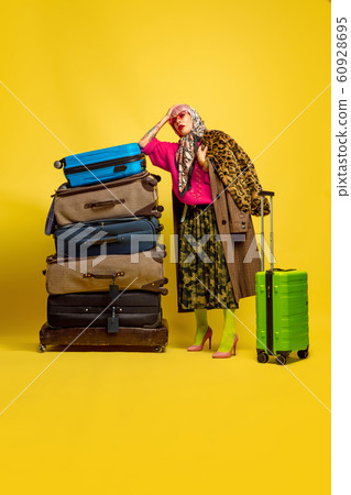 Caucasian woman's portrait isolated on yellow studio background, influencer be like 60928695