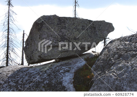 Large megalithic seid stone boulder in the nature Large megalithic seid stone boulder in the nature 60928774