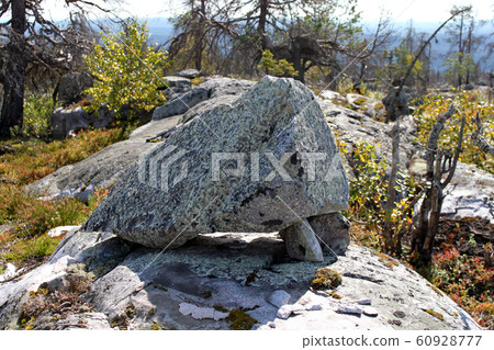 Large megalithic seid stone boulder in the nature Large megalithic seid stone boulder in the nature 60928777