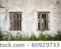windows of an abandoned house 60929733