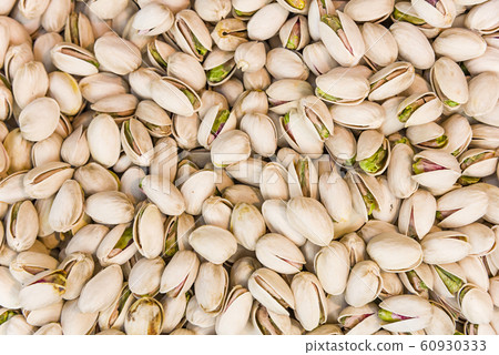 Roasted and salted pistachios in shell texture, 60930333