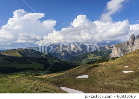 Peaks of Dolomites in the afternoon light. 60930569