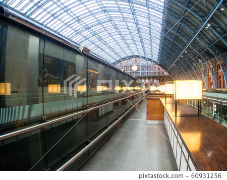 Eurostar stopping at London Euston station made of arched steel Eurostar stopping at London Euston station made of arched steel 60931256