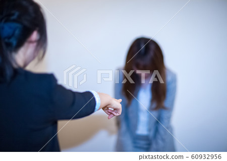 Image of female manager scolding new girl Power harassment 60932956