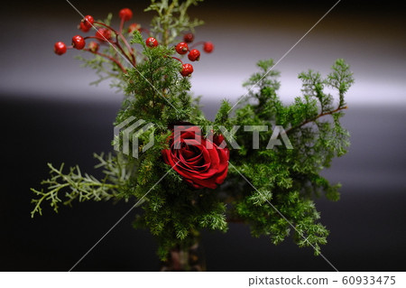 Red rose and rosemary flower arrangement 60933475
