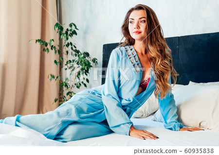 fashion portrait of a beautiful woman in underwear home in bedroom wife 60935838