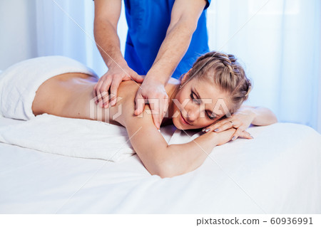 the doctor makes a back massage and body girl spa treatments the doctor makes a back massage and body girl spa treatments 60936991