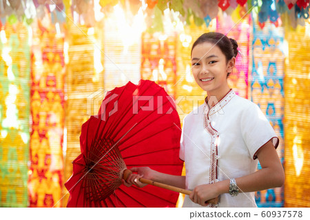 Asian girl in northern traditional costume and red Asian girl in northern traditional costume and red 60937578