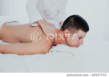 a massage therapist makes a man massage spa treatment health a massage therapist makes a man massage spa treatment health 60937743