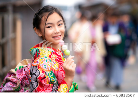 Japanese girl in traditional kimono dress Japanese girl in traditional kimono dress 60938507