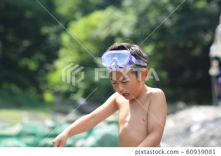 Boys enjoying fishing Boys enjoying fishing 60939081