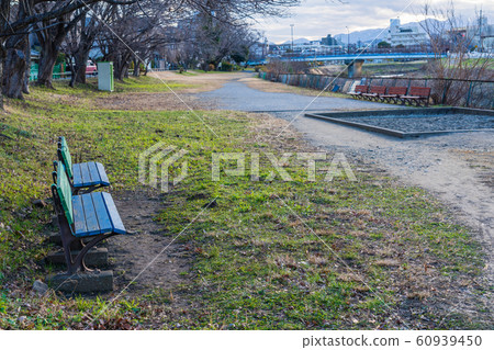 A landscape with a bench 60939450