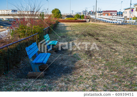 A landscape with a bench 60939451