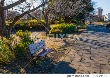 A landscape with a bench 60939455