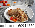 Roasted rabbit with buckwheat porridge and 60941879