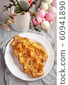 Almond Danish pastry on an Easter table 60941890