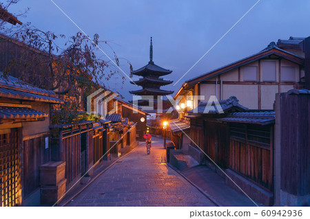 An Asian woman wearing Japanese traditional kimono An Asian woman wearing Japanese traditional kimono 60942936