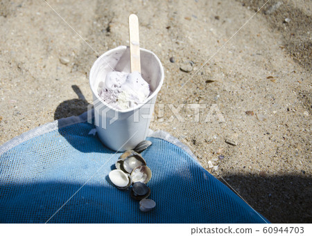 pack of ice cream with a stick and shells pack of ice cream with a stick and shells 60944703