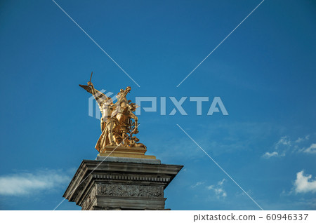 Column with golden statue over the Seine River in Paris Column with golden statue over the Seine River in Paris 60946337